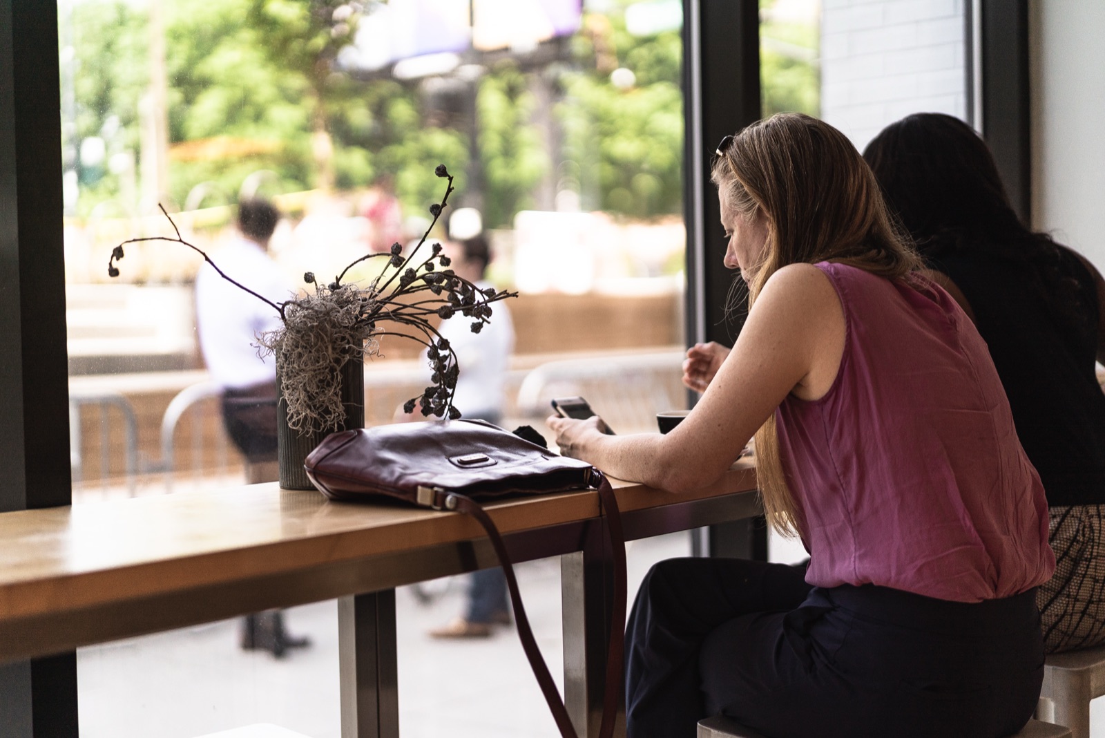 A customer enjoying the café, where anonymous loyalty technology works invisibly in the background