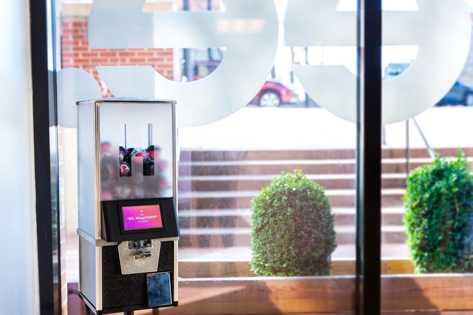 The social vending machine installed at Huge Café, with its custom touchscreen interface