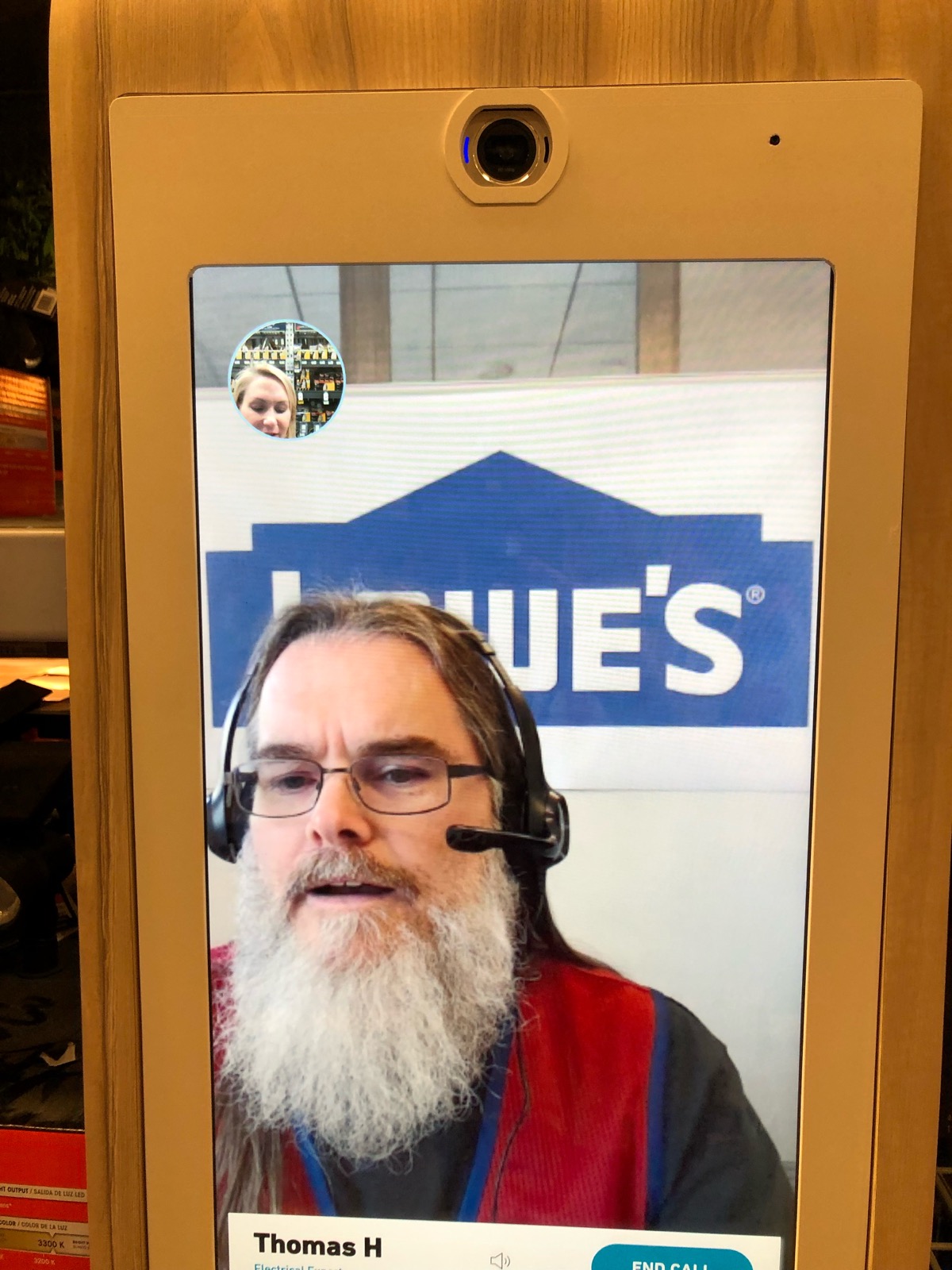 Red Vest Now kiosk in a Lowe's store