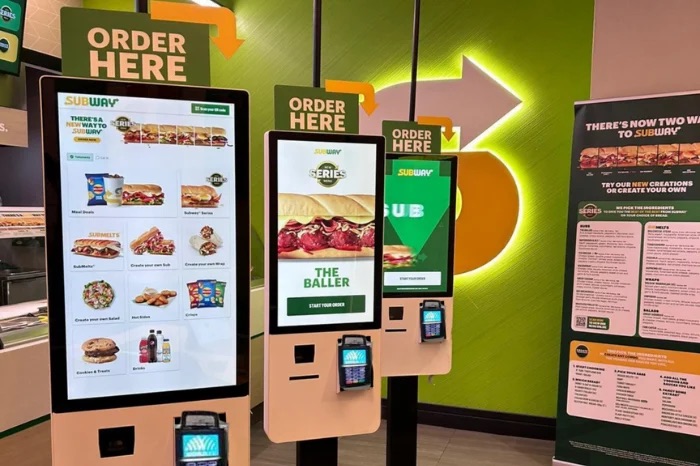 Subway digital ordering kiosks in a modernized restaurant location